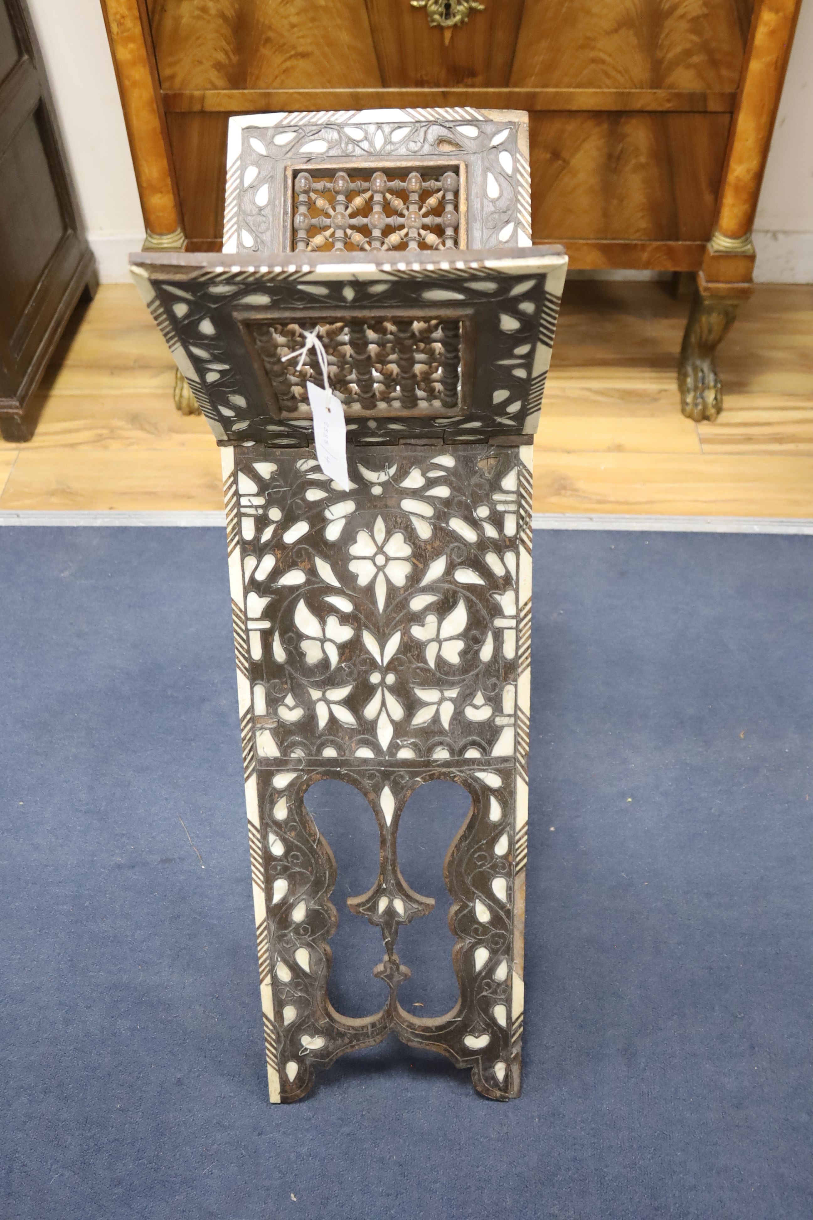 A 19th century mother of pearl inlaid Middle Eastern Koran stand, height 73cm